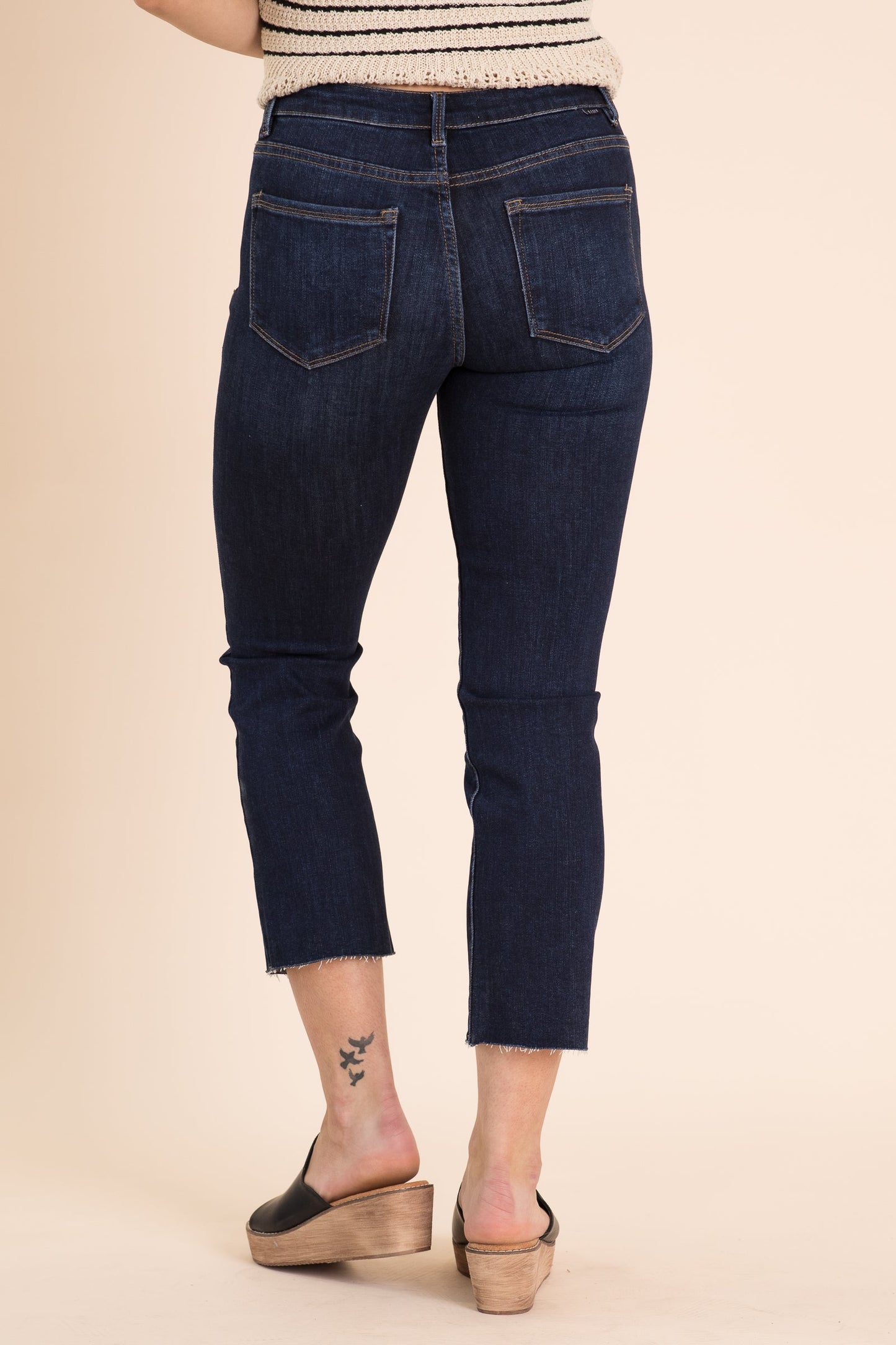 Risen Mid Rise Raw Hem Straight Leg Jeans